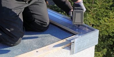 Plumbing work on a flat roof